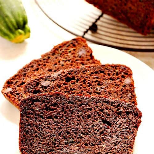 Slices of chocolate bread on white plate.