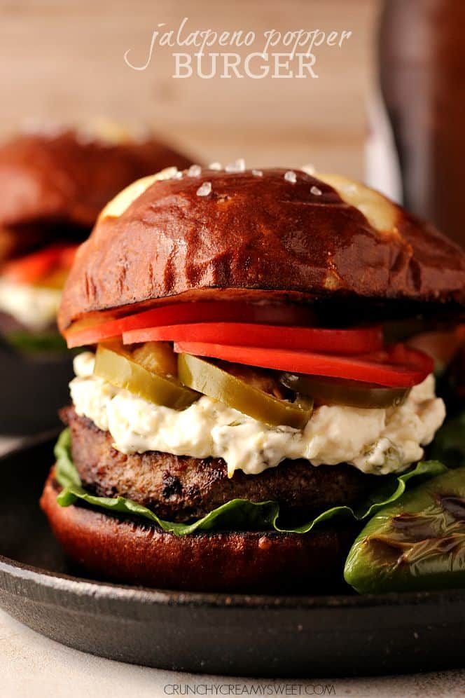 burger with jalapeno slices on plate