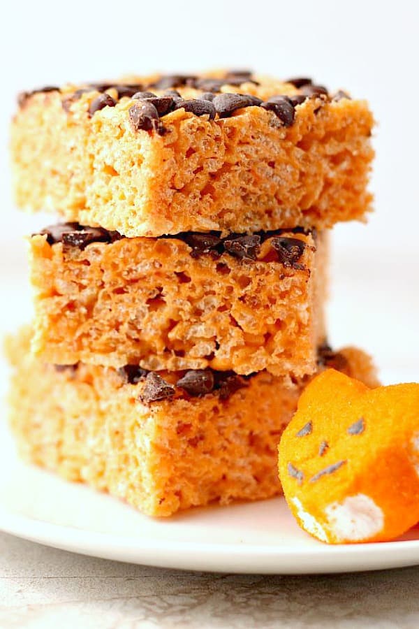 Pumpkin Spice Rice Krispies Treats stacked up.