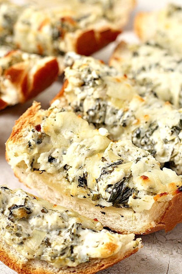 Sliced Spinach Artichoke Dip Cheesy Bread.