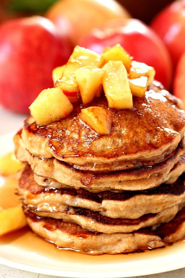 Apple Cider Pancakes - sweet and fluffy pancakes made with apple cider and topped with cinnamon sugar apples! Perfect fall weekend breakfast! Stack of Apple Cider Pancakes.