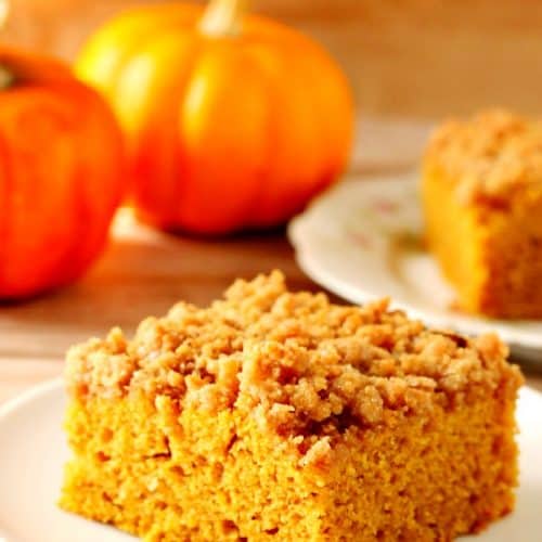 Pumpkin Coffee Cake slice on a white plate.