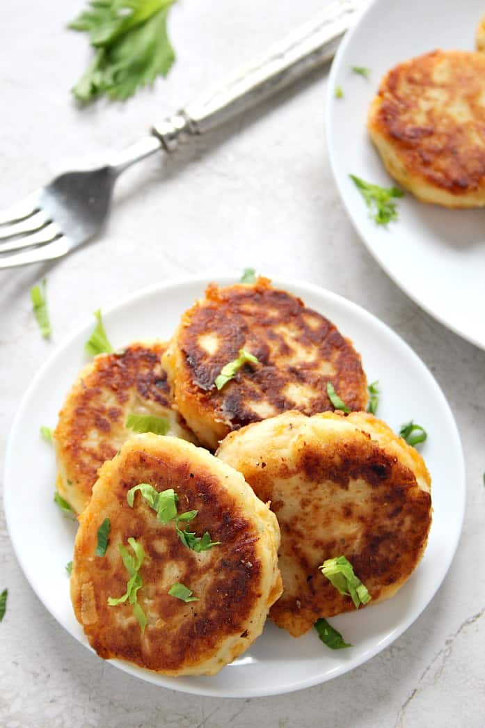 Leftover Mashed Potato Cheddar Ranch Cakes - the best use for your leftover mashed potatoes. Crispy cakes filled with cheese and ranch seasoning. Just 5 ingredients and 20 minutes is all you need to make them!