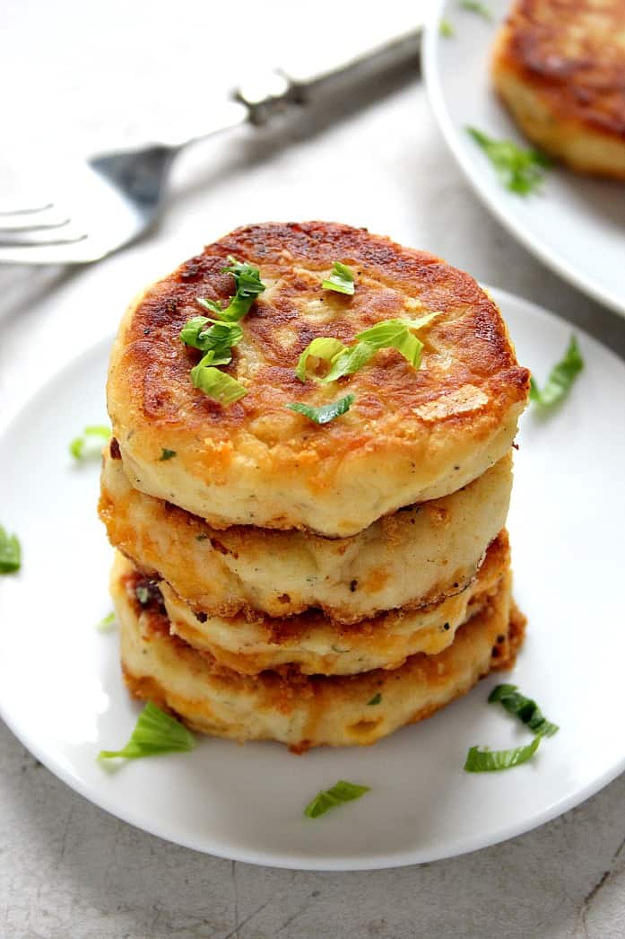 Leftover Mashed Potato Cheddar Ranch Cakes - the best use for your leftover mashed potatoes. Crispy cakes filled with cheese and ranch seasoning. Just 5 ingredients and 20 minutes is all you need to make them!