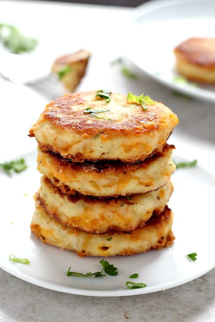 Leftover Mashed Potato Cheddar Ranch Cakes - the best use for your leftover mashed potatoes. Crispy cakes filled with cheese and ranch seasoning. Just 5 ingredients and 20 minutes is all you need to make them!