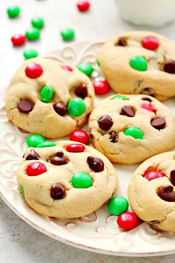 Christmas M&M Cookies on plate with red and green candy.