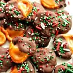 Chocolate Caramel Pretzel Bites on a white plate.