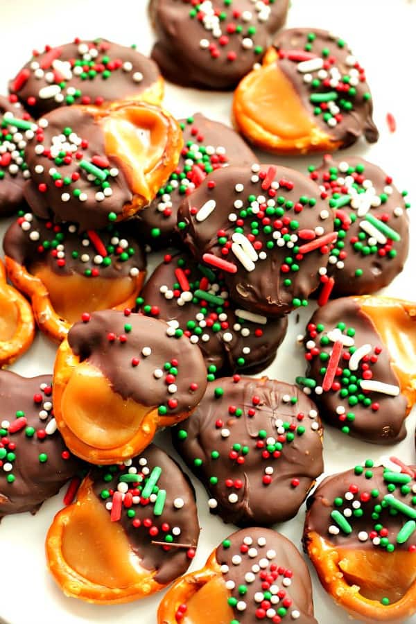 Chocolate Caramel Pretzel Bites on a white plate.