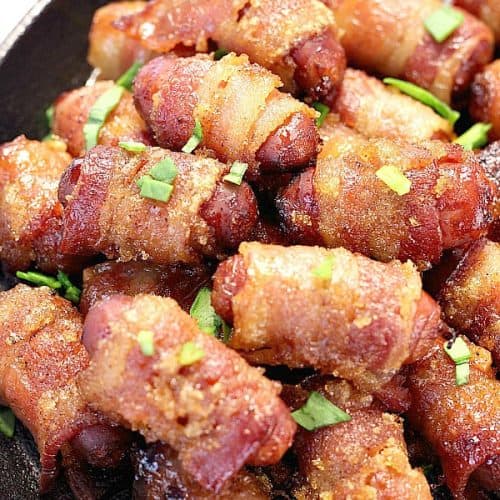 Bacon Wrapped Little Smokies in a skillet.