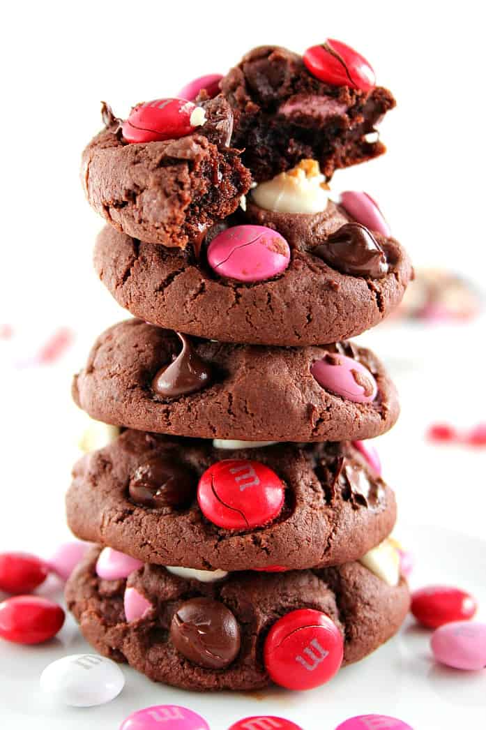 Double Chocolate M&M Cookies Recipe - soft and chewy pudding cookies packed with cocoa powder, semi-sweet chocolate chips, white chocolate chips and bright red and pink M&M's! Make a batch and bake it - all in 30 minutes! 