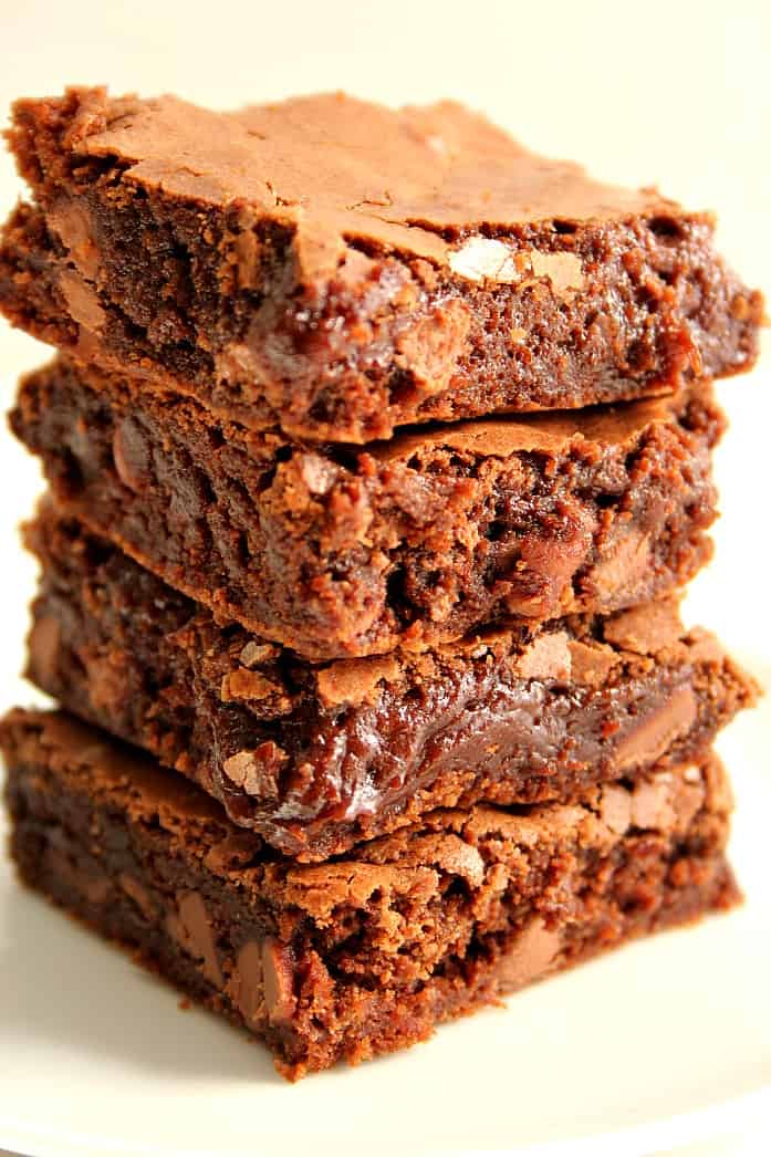 Homemade Fudge Brownies Recipe Brownies stacked up on each other.
