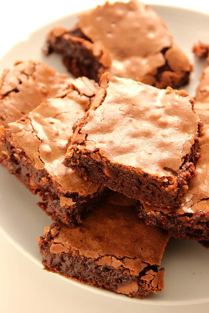 Homemade Fudge Brownies on white plate.