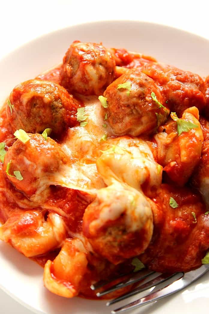 One Pot Cheesy Tortellini and Meatballs Recipe - easy weeknight meal that your family will love! Cheesy, saucy and made with just a few ingredients!