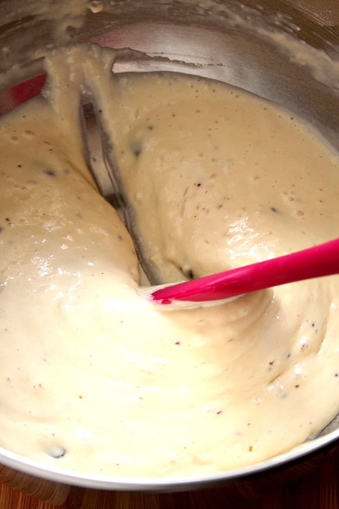 Pancake batter in a metal bowl. 