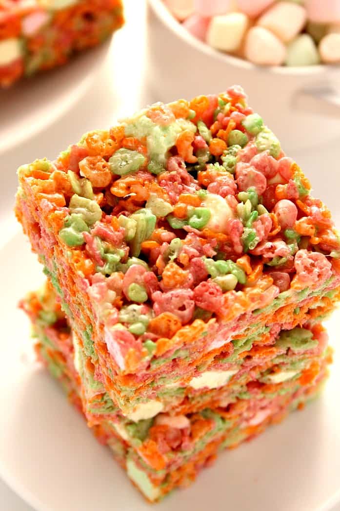 Ice Cream Pebbles Marshmallow Cereal Bars Recipe - a 3-ingredient rice krispies style treat made with Rainbow Sherbet Pebbles cereal! So fun to make and eat! 