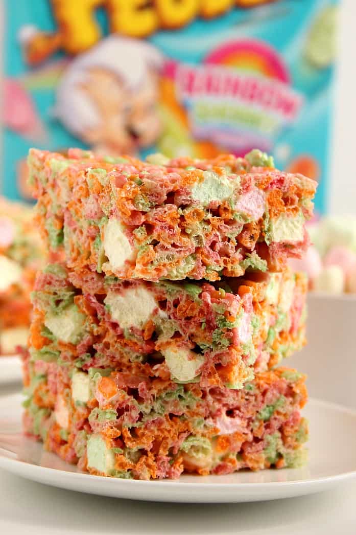 Ice Cream Pebbles Marshmallow Cereal Bars Recipe - a 3-ingredient rice krispies style treat made with Rainbow Sherbet Pebbles cereal! So fun to make and eat! 