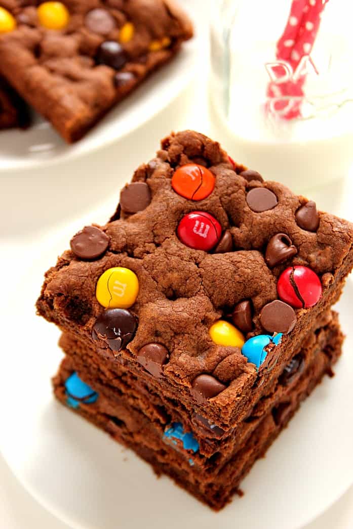 Cookie bars stacked on a plate.