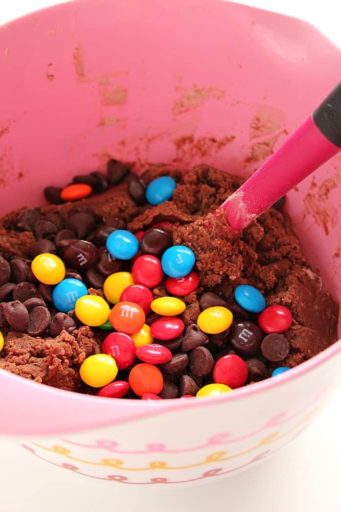 Cookie dough with M&M's in a bowl.