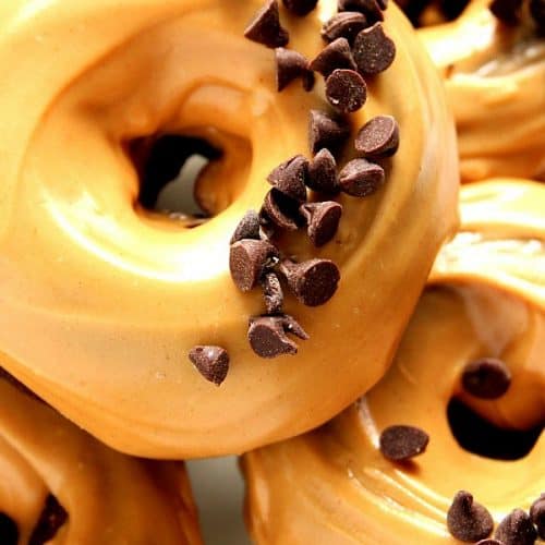 Group of Peanut Butter Glazed Chocolate Donuts.