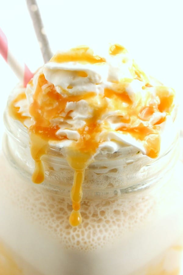 Homemade Salted Caramel Frappuccino Recipe - my favorite coffee shop drink in it's lighter, homemade version. So easy and absolutely delicious! Salted Caramel Frappe in a mug.