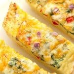 Cheesy Egg Boats on a plate.