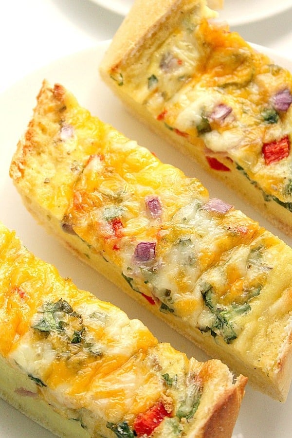 Cheesy Egg Boats on a plate.