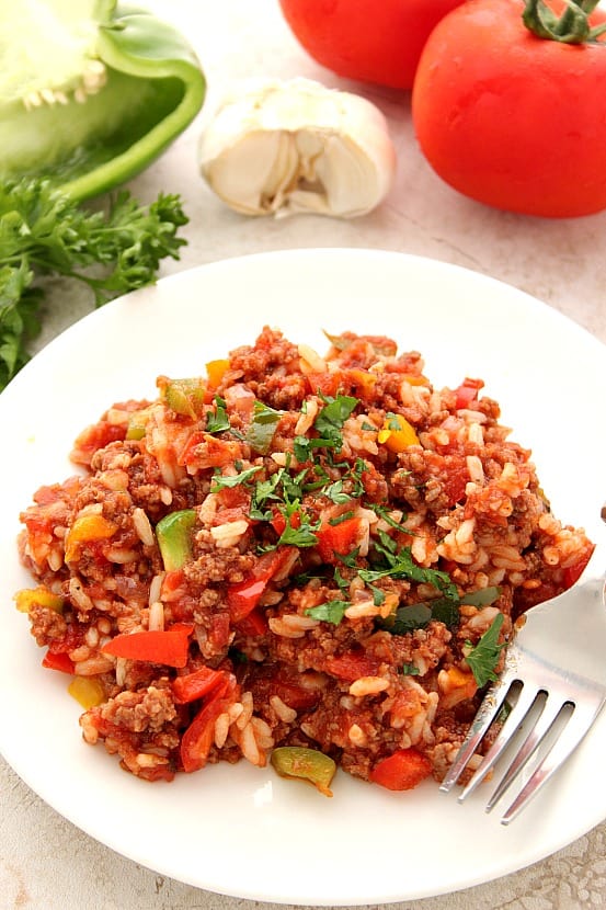 Stuffed Pepper Rice Skillet recipe - a classic dish simplified! Perfectly seasoned ground beef, rice, colorful peppers, onions and garlic make this skillet dinner a family favorite! All done in 20 minutes! 