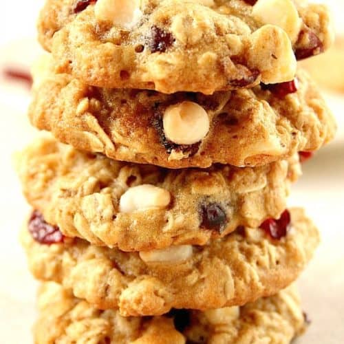 Cranberry White Chocolate Oatmeal Cookies stacked up.