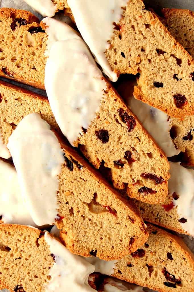 White Chocolate Cranberry Banana Biscotti - a must-make holiday cookie this season! Banana biscotti filled with dried cranberries and dipped in white chocolate! 