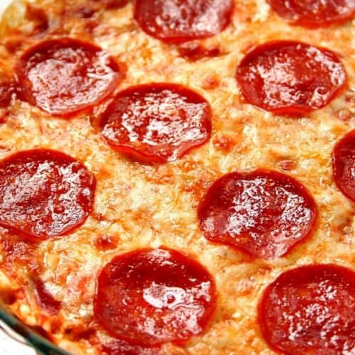 Close up shot of baked pepperoni pizza dip.