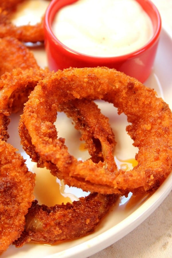 Buffalo Onion Rings with dipping sauce.