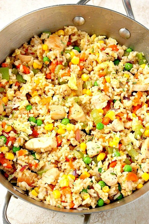 Fried rice in stainless steel skillet.