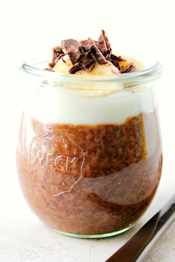 Chocolate chia pudding in a small jar.