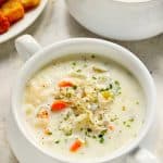 Slow Cooker Chicken Wild Rice Soup in a soup bowl with handles.