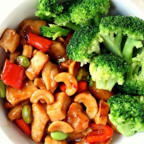 Chicken with cashews and veggies in a bowl.