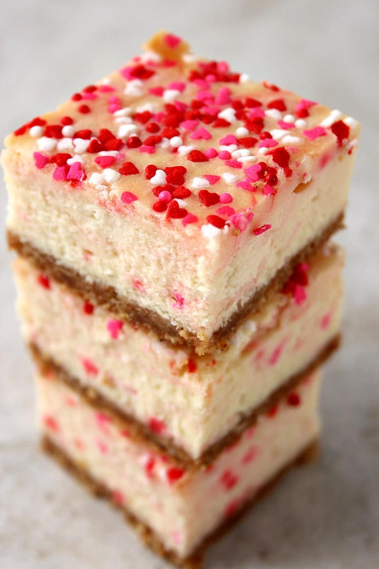 Funfetti Cheesecake Bars Recipe - sweet, creamy and thick cheesecake bars with sprinkles! So fun and festive and super easy to make! 