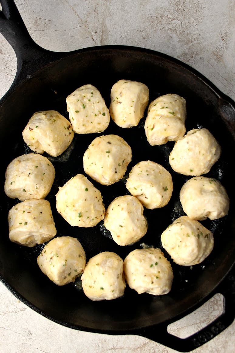 Garlic Parmesan Skillet Rolls Recipe - buttery rolls baked in a skillet for a fun pull-apart effect. Perfect with a bowl of soup or pasta!