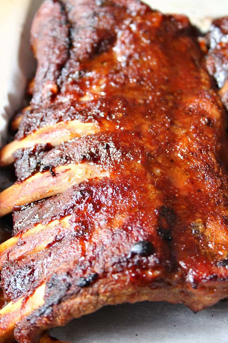 Close up shot of cooked baby back ribs rack.
