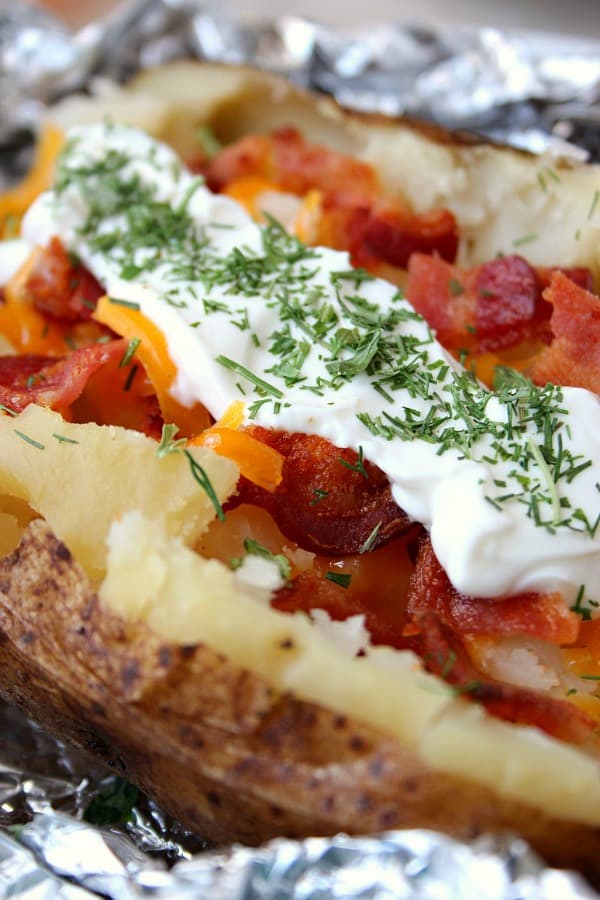 Slow Cooker Baked Potatoes Recipe Baked Potato with toppings.