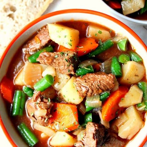 Overhead shot of beef stew in soup bowl.