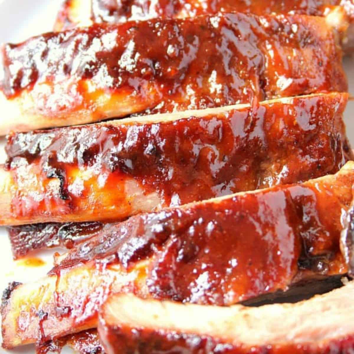 Sliced ribs on a baking sheet.