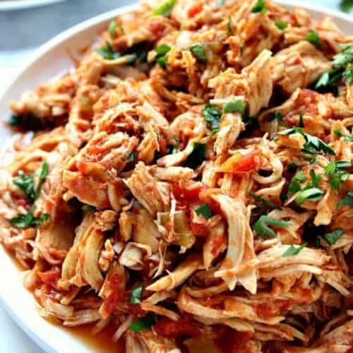 Shredded chicken in a bowl.