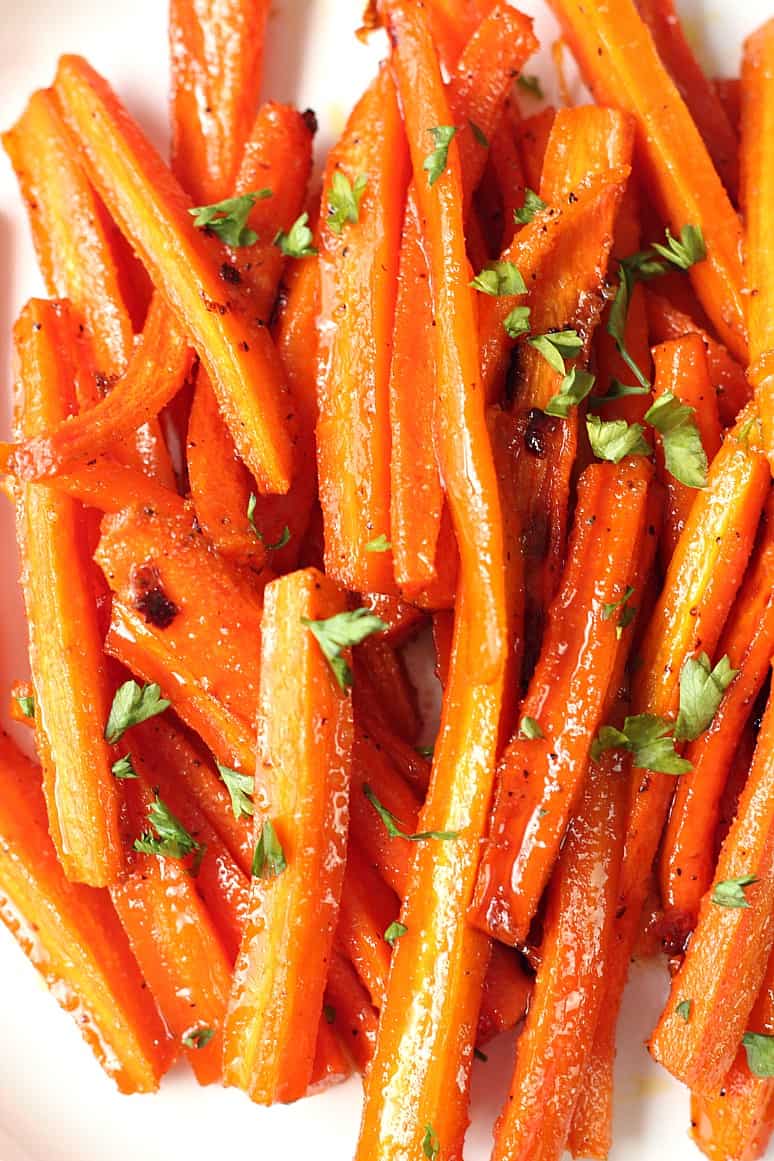 Brown Sugar Roasted Carrots - sweet and garlicky carrots roasted to perfection! The easiest and most delicious way to enjoy this vegetable!