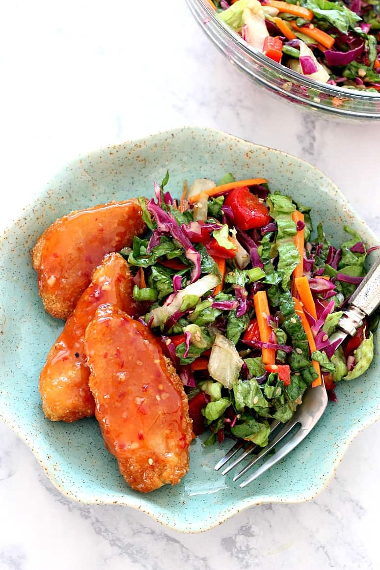 Asian Chopped Salad with Garlic Sesame Vinaigrette Recipe served with Sweet Chili Pollock Tenders - quick and easy weeknight dinner idea with a ton of flavor! Asian Chopped Salad with Garlic Sesame Vinaigrette Recipe served with Sweet Chili Pollock Tenders - quick and easy weeknight dinner idea with a ton of flavor!