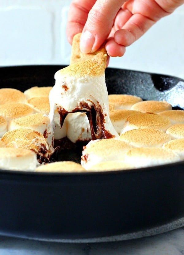 Chocolate and marshmallow dip in cast iron skillet.