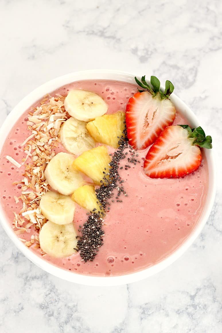 Strawberry Pineapple Smoothie Bowl Recipe Strawberry smoothie in a bowl.