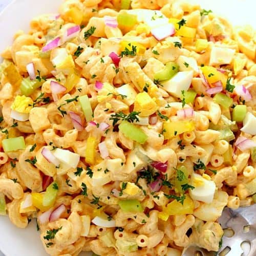 Deviled Egg Macaroni Salad on large white plate.