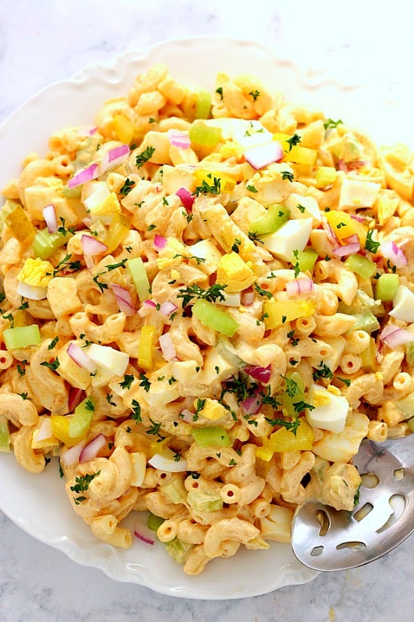 Deviled Egg Macaroni Salad on large white plate.