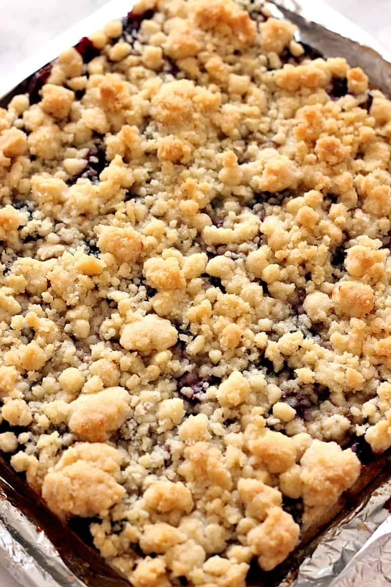 Cherry crumb bars in a baking dish.