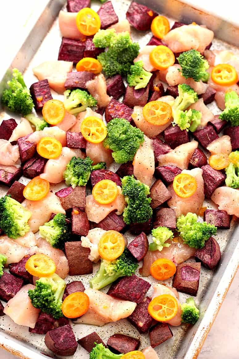 Sheet Pan Chicken with Kumquats and Purple Potatoes - bright, colorful and fresh dinner idea. Purple potatoes, broccoli and kumquats make for a bursting mix of flavors!